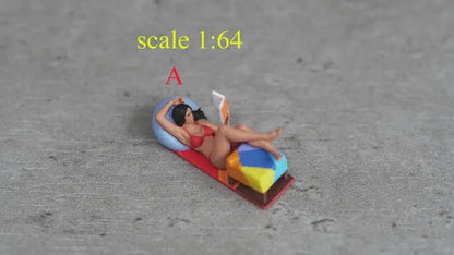 Girl lying down reading a book figurine handpaint high detail 1:18 to HO scale