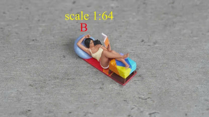 Girl lying down reading a book figurine handpaint high detail 1:18 to HO scale