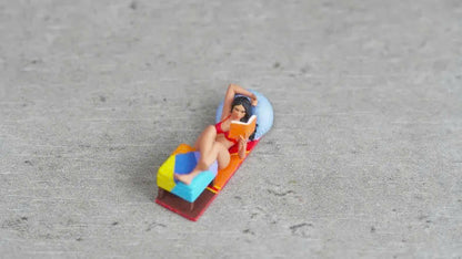 Girl lying down reading a book figurine handpaint high detail 1:18 to HO scale